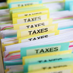 image of a wall with the words tax time