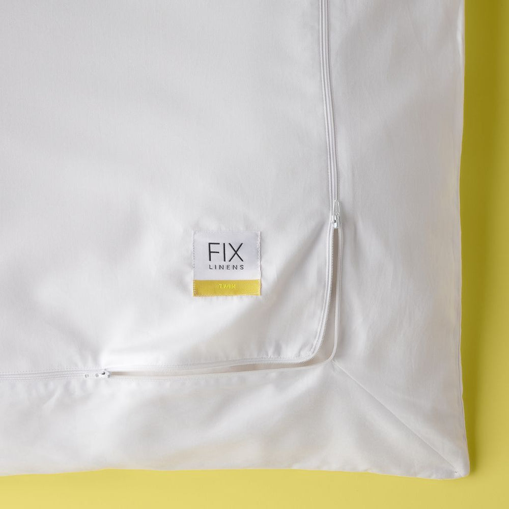 fix linens white twin duvet cover. triple zip duvet cover. triple zip, easy change, color coded tag. 100% long-staple cotton.