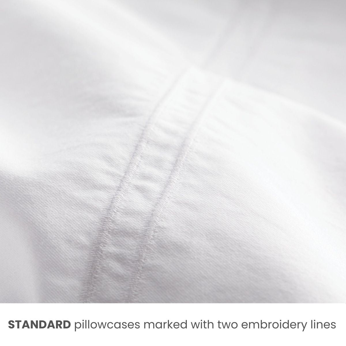 Standard pillowcase sheet detail close-up showing size indicator embroidery