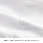 Full white cotton flat sheet with embroidery line indicating size, ideal for Airbnb hosts